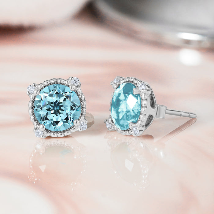 シルバー/K18WGP 合計3.50ct. ヘイローラウンドカット ミル打ち 綺麗な12月の誕生石ブルートパーズスタッドピアス